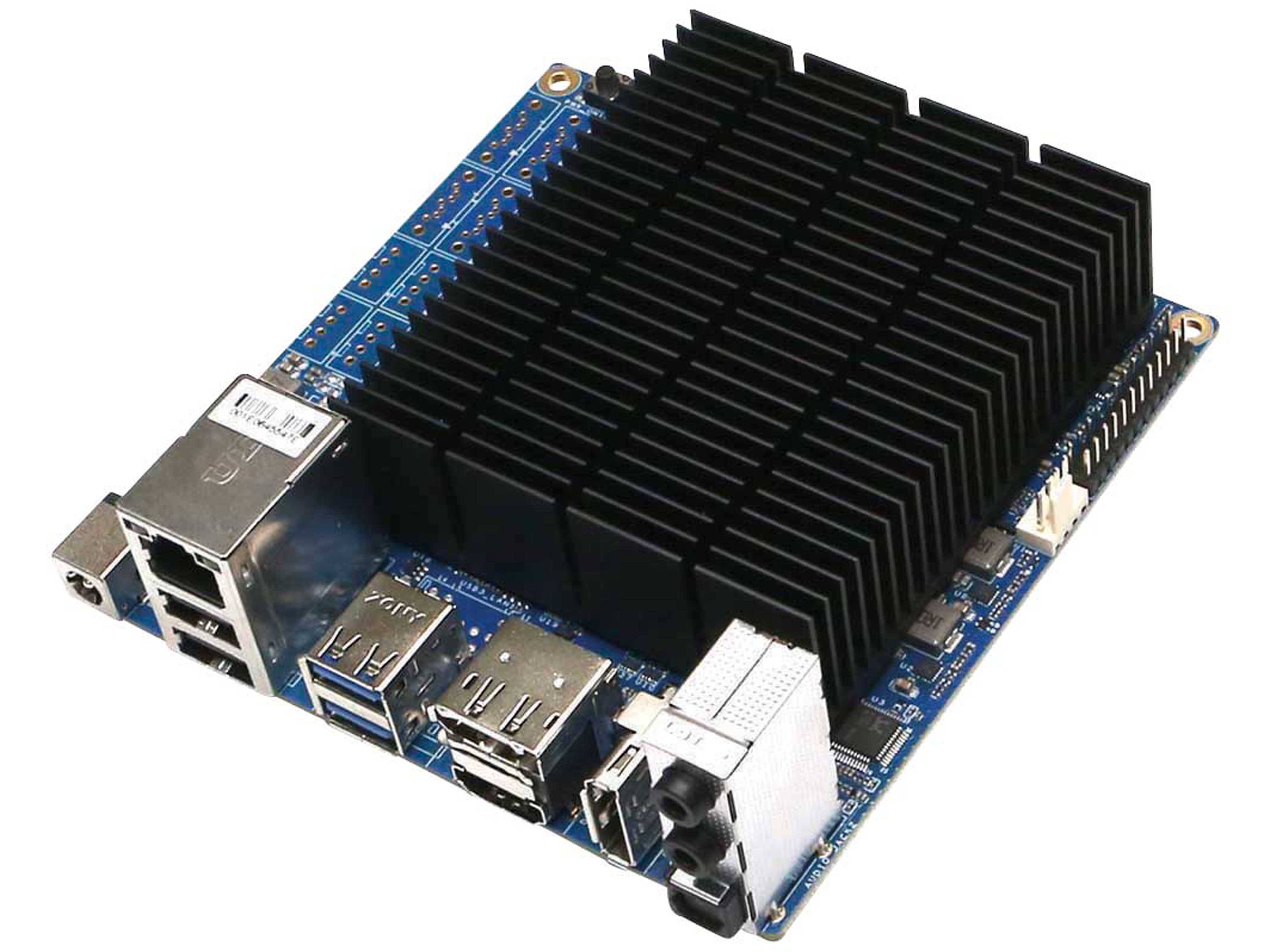 Ein Single-Board-Computer mit Kühlkörper, ausgestattet mit mehreren USB-Anschlüssen, einem HDMI-Anschluss und Ethernet-Konnektivität, entwickelt für Tech-Projekte.