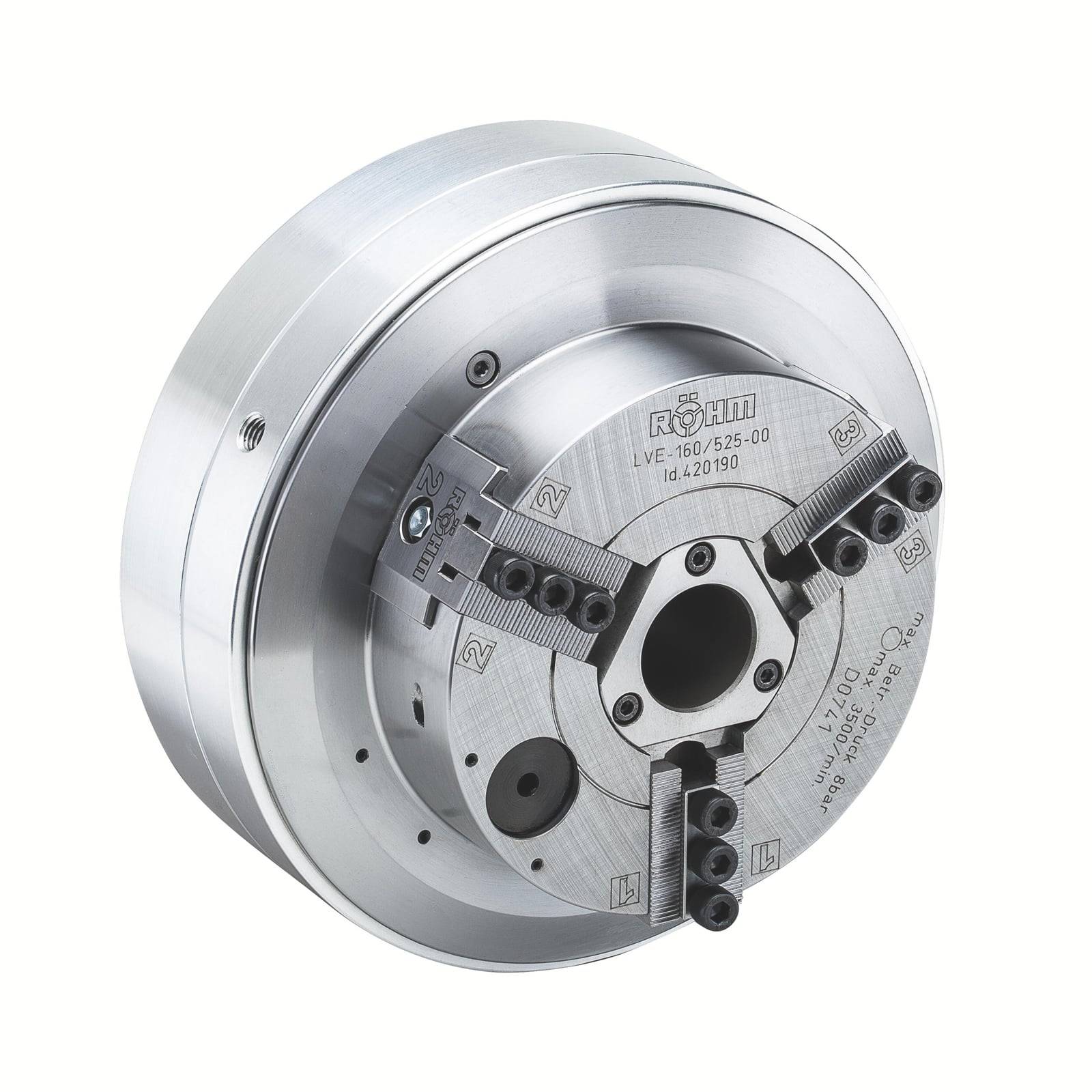 Ein metallischer mechanischer Spannfutter mit vier verstellbaren Backen, das zur Bearbeitung und präzisen Halterung in Fertigungsumgebungen verwendet wird.