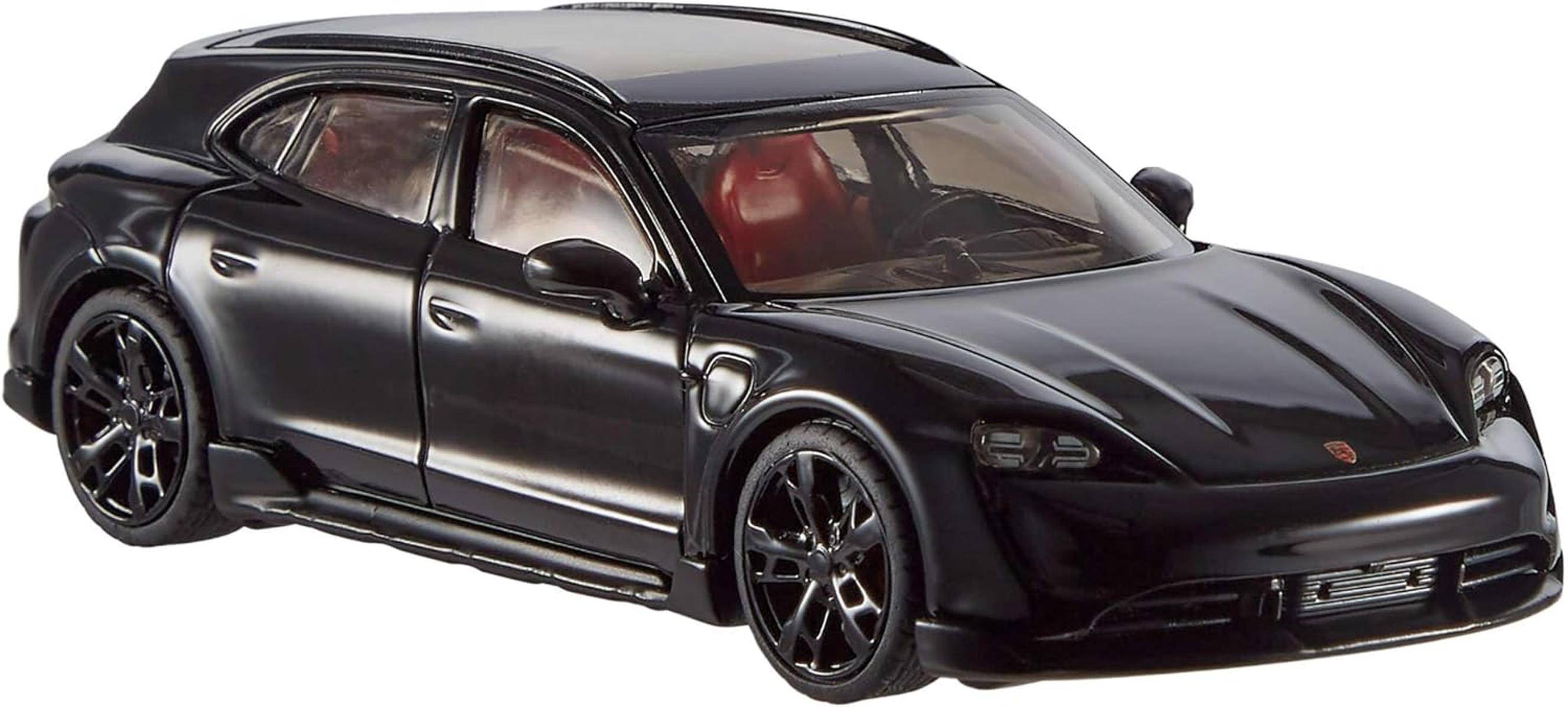 Ein schlanker schwarzer Sportwagen mit getönten Fenstern, rotem Innenraum und glänzender Oberfläche, von vorne aus dem Fahrer-Seite-Winkel betrachtet.