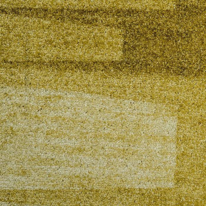 Ein strukturierter Teppich mit geometrischem Muster, das Töne von Beige und Braun in rechteckigen Formen aufweist und ein geschichtetes Aussehen erzeugt.