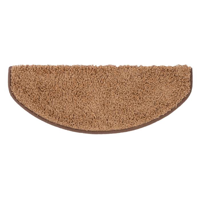 Eine braune, halbkreisförmige Fußmatte mit strukturierter Oberfläche zum Abwischen von Schuhen sitzt vor einem schlichten Hintergrund.