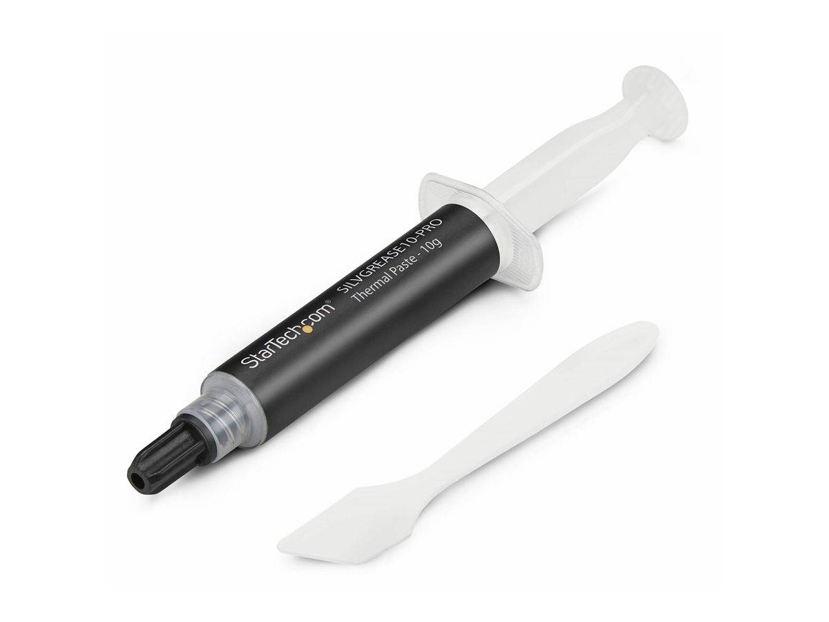 Spritzenförmige Tube mit Wärmepaste und weißem Applikatorspachtel auf einfachem Hintergrund.