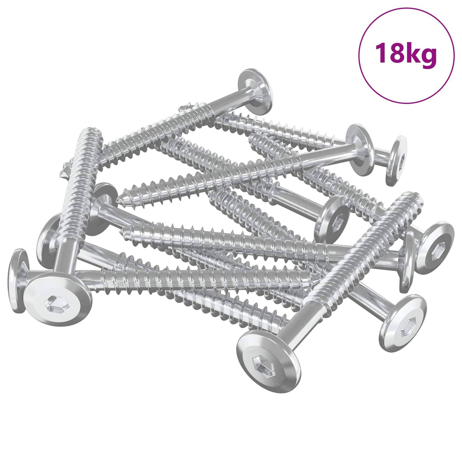 Eine Sammlung glänzender silberner Schrauben, die in einem zufälligen Haufen angeordnet sind, mit einer Beschriftung in der oberen rechten Ecke, die '18 kg' anzeigt.