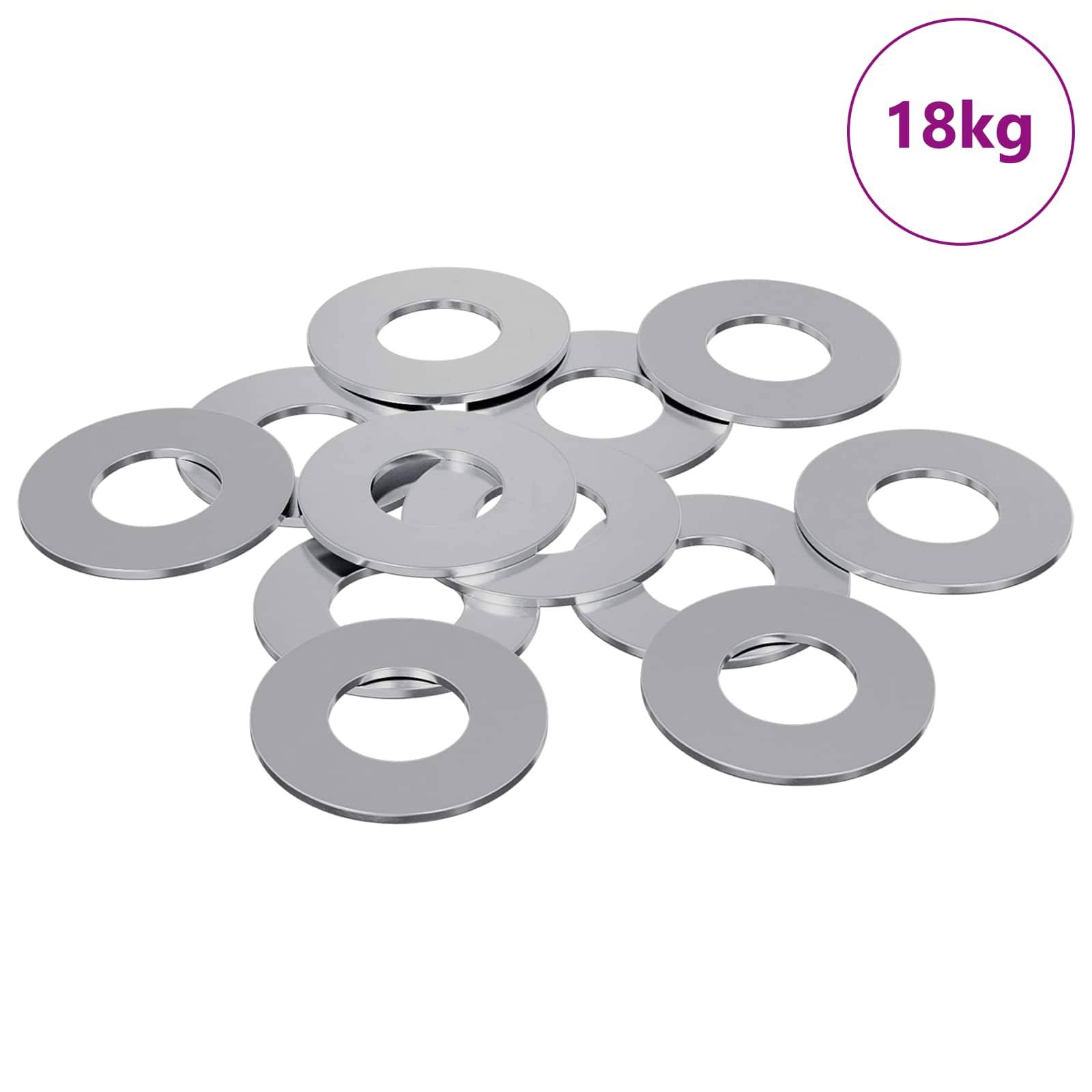 Ein Stapel silberfarbener Metallscheiben mit Löchern in der Mitte, mit einem Gesamtgewicht von 18 kg wie in der oberen rechten Ecke angegeben.