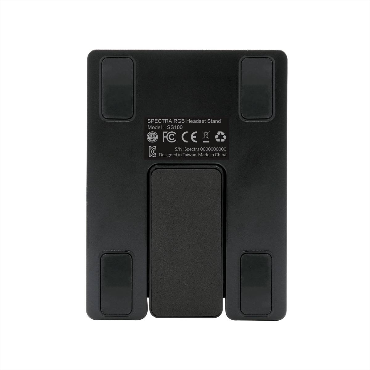 Black Spectra RGB Kopfhörerständer Modell SC100, entworfen in Taiwan, hergestellt in China; rechteckige Basis mit vier Gummiauflagen.