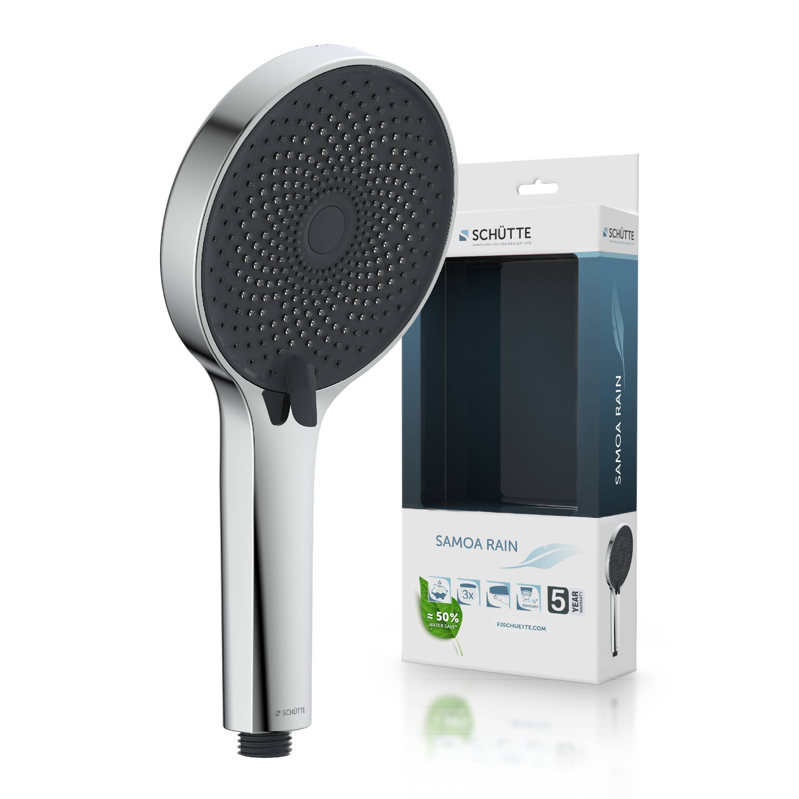 Duschkopf mit rundem, schwarzem Gesicht und Chromgriff vor einer offenen Schachtel mit der Aufschrift „Schütte Samoa Rain