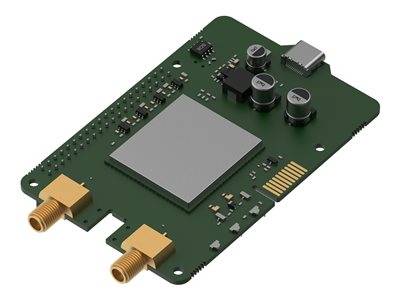 Ein kleines, rechteckiges Schaltboard mit verschiedenen elektronischen Komponenten, einschließlich Kondensatoren und Steckverbindern, möglicherweise für Kommunikationsgeräte.