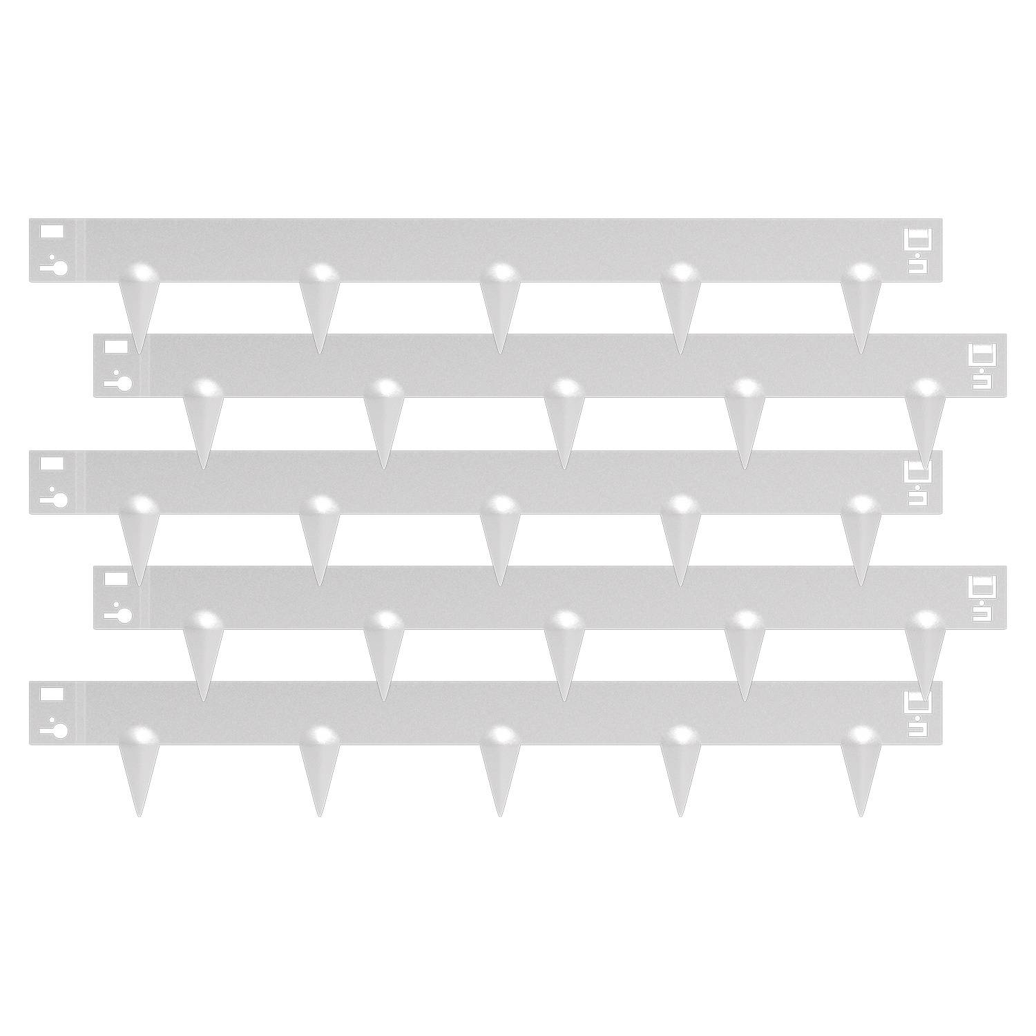 Weiße Kunststoff-Vogelspitzen mit vier Reihen, verwendet zur Abschreckung von Vögeln, damit diese nicht auf Oberflächen landen.