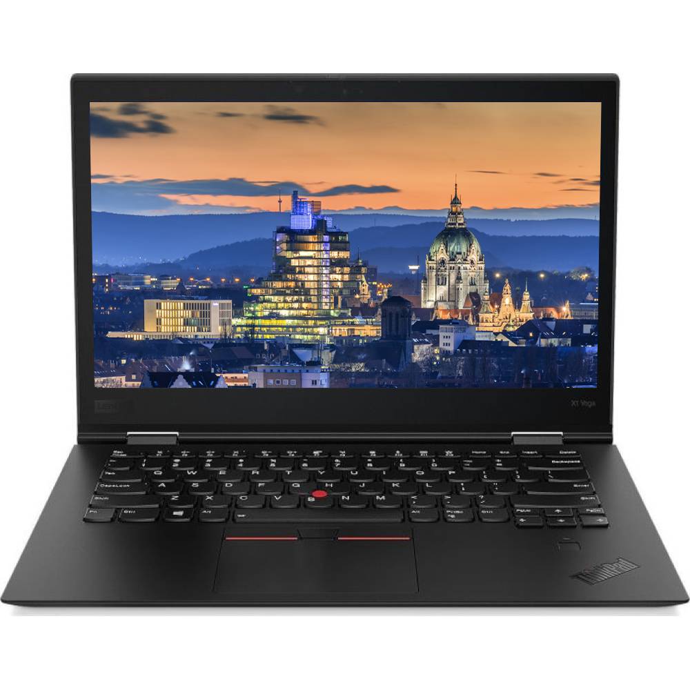 Ein Laptop zeigt eine Stadtlandschaft in der Dämmerung auf seinem Bildschirm an, mit beleuchteten Gebäuden und einem klaren Himmel mit Bergen im Hintergrund.
