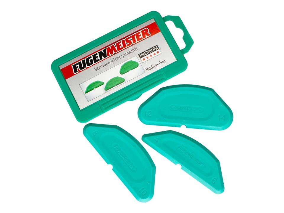 Ein Satz türkisfarbener FugenMeister-Formwerkzeuge in verschiedenen Größen, neben ihrem beschrifteten Transportkoffer angeordnet.