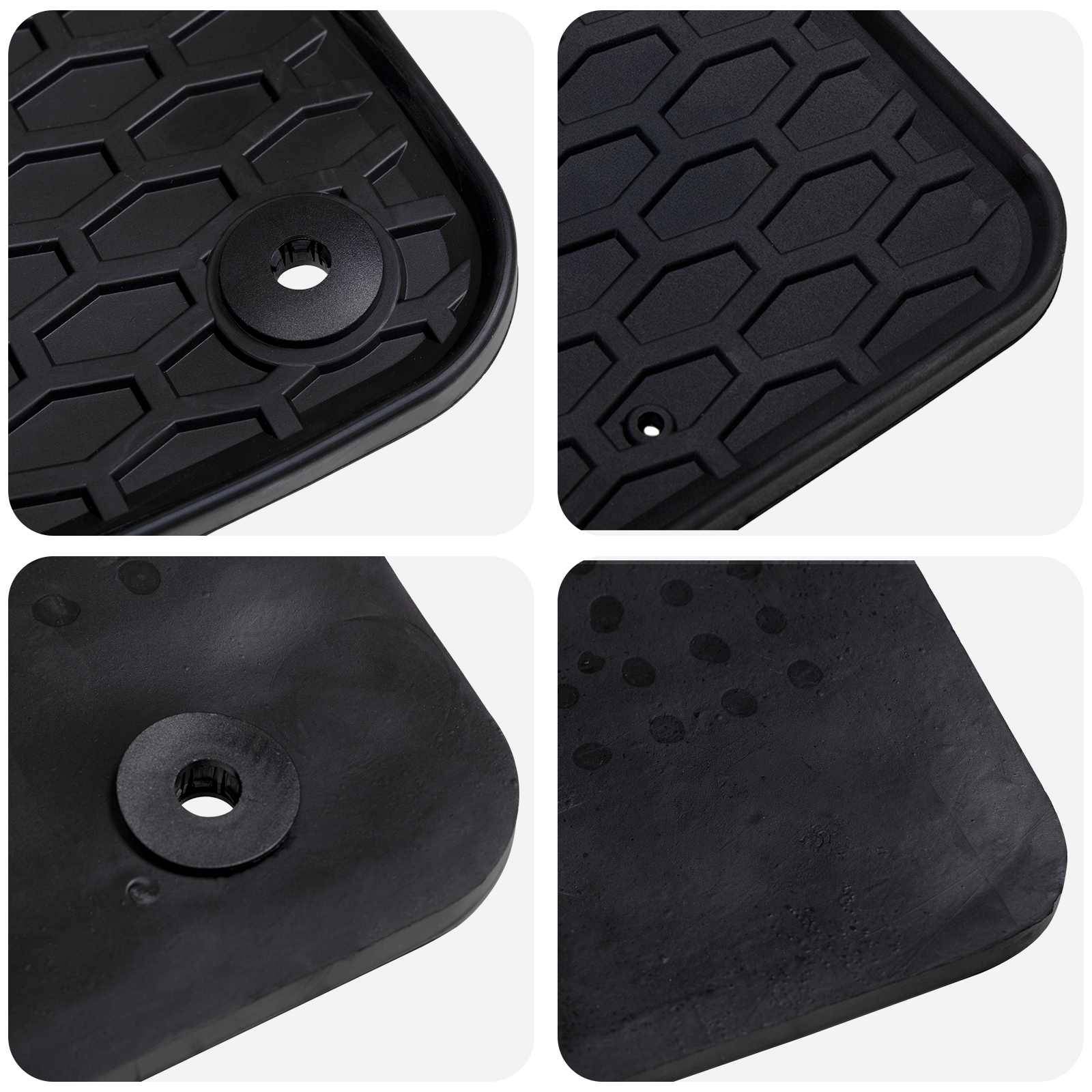 Satz schwarzer Gummi-Autofußmatten mit strukturierten Oberflächen und kreisförmigen Befestigungslöchern.