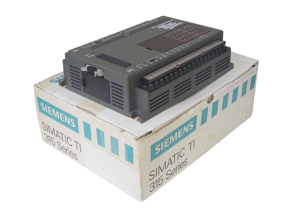 Siemens SIMATIC TI 315 Series Modul auf seiner Verpackungsbox, das industrielle Automatisierungsausrüstung zeigt.