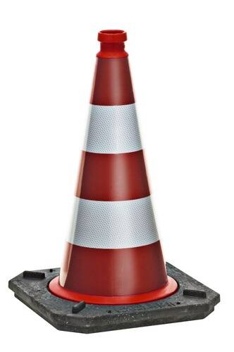 Ein rot-weißer Verkehrskegel auf schwarzer Basis, typischerweise verwendet, um Vorsicht oder Einschränkung in einem bestimmten Bereich zu signalisieren.