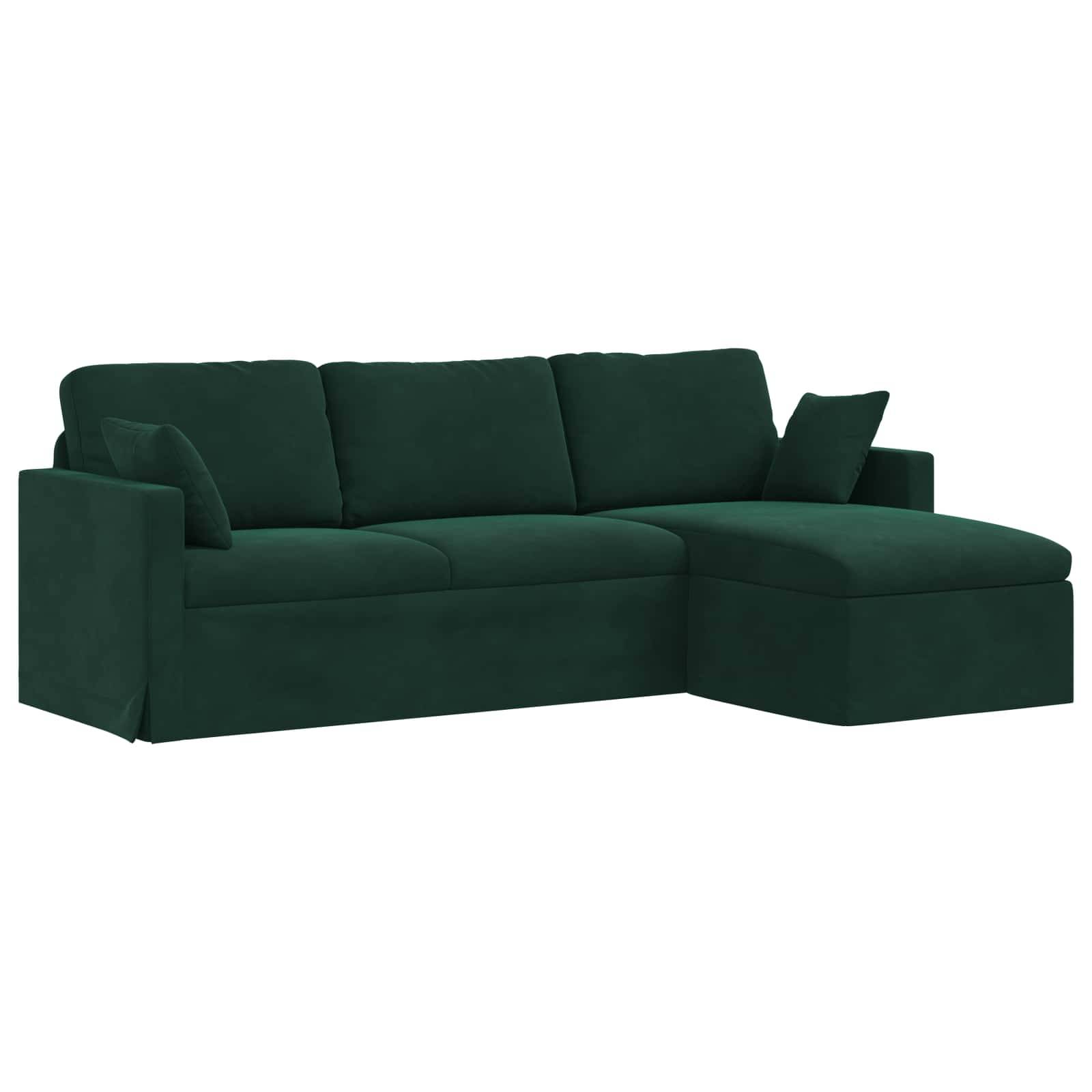 Ein dunkelgrünes Ecksofa mit einer Chaiselongue auf der rechten Seite, mit klaren Linien und modernem Design.