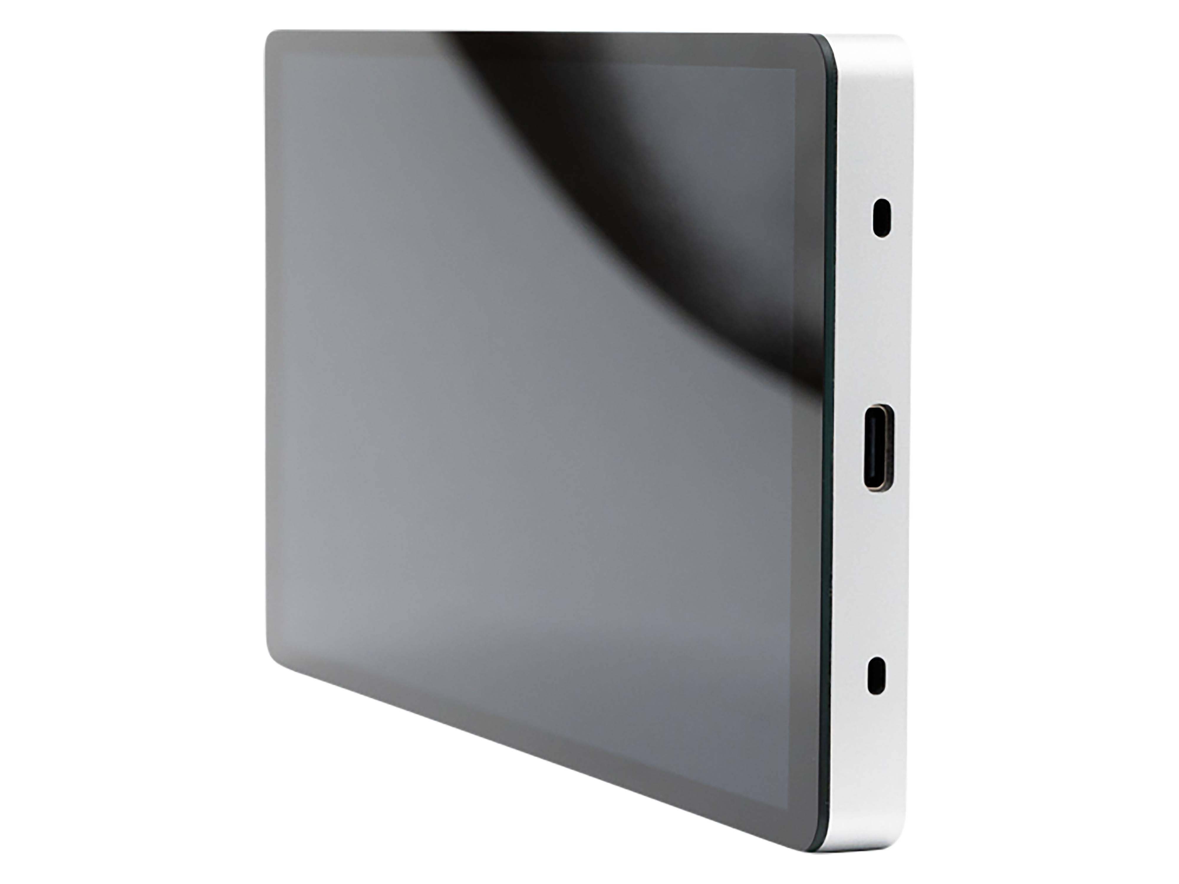 Ein kompaktes, rechteckiges Metallgerät mit USB-C-Anschluss, wahrscheinlich ein Tablet oder ein kleines Display, das ein minimalistisches Design präsentiert.
