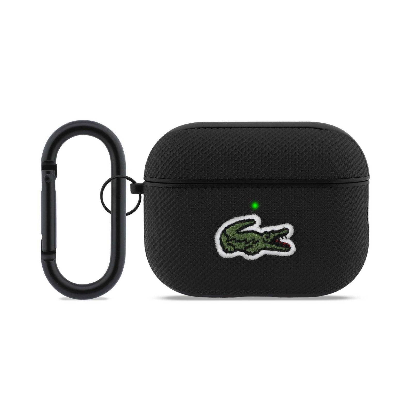 Schwarze AirPods-Hülle mit strukturierter Oberfläche, mit grünem Krokodil-Logo und angebrachtem schwarzem Karabiner.