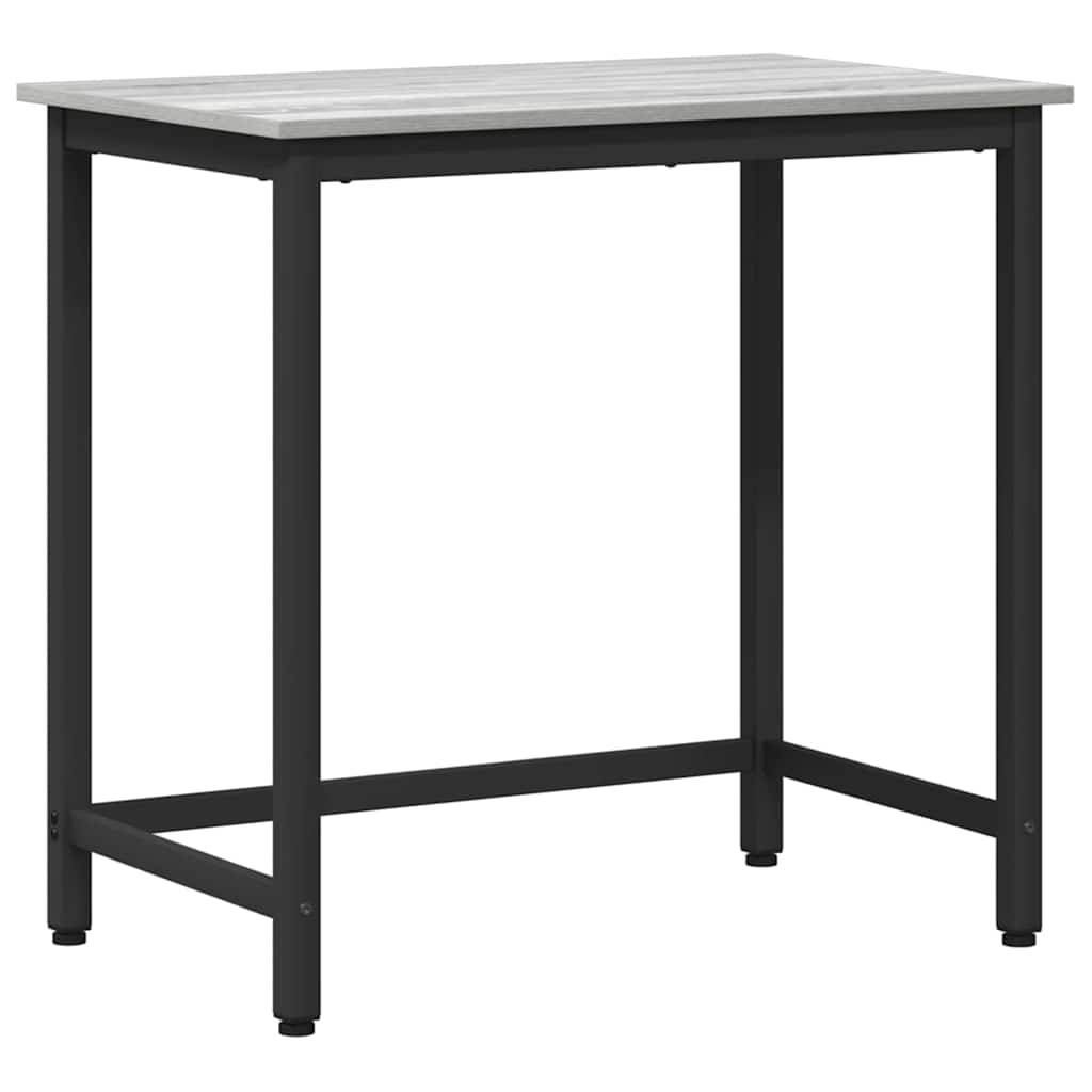 Ein rechteckiger Tisch mit einer hellgrauen Holzplatte und schwarzen Metallbeinen, entworfen im minimalistischen Stil und für verschiedene Umgebungen geeignet.