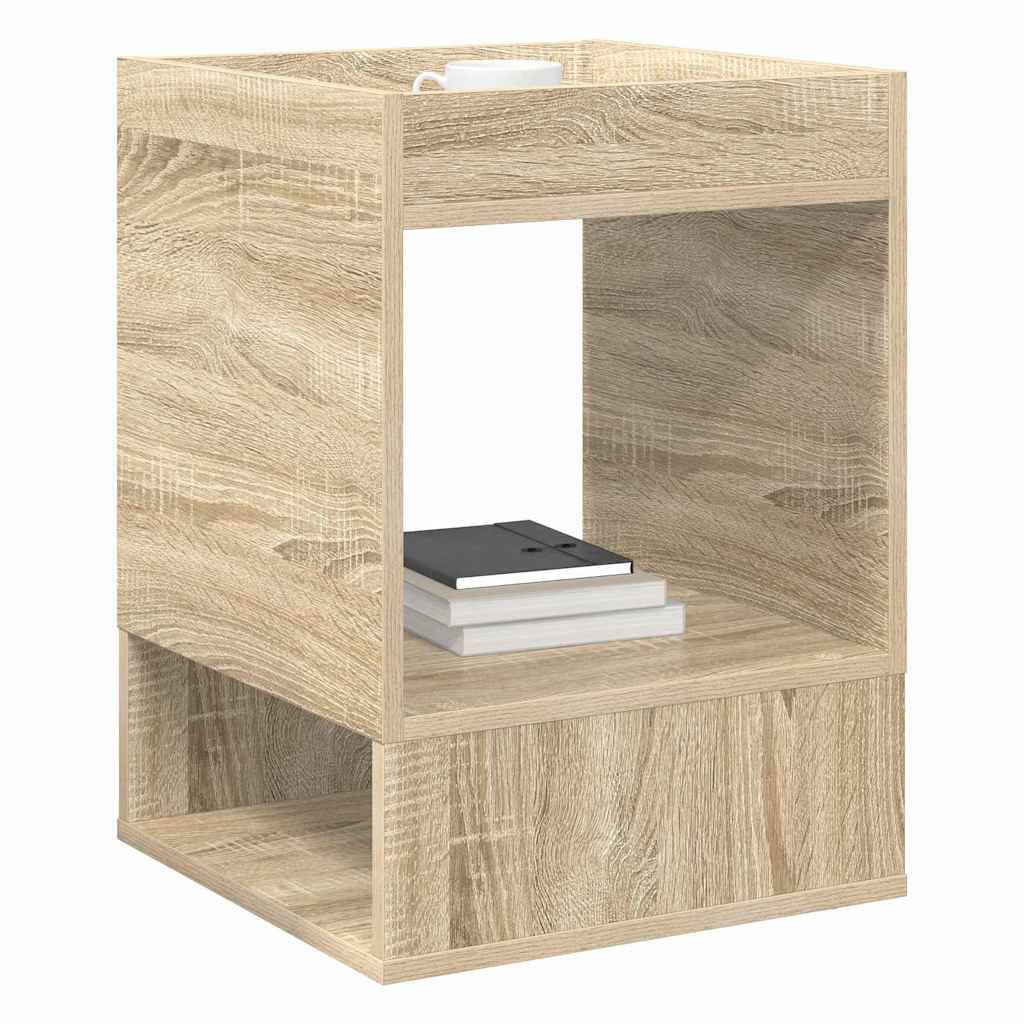 Ein Holz-Beistelltisch mit offenem Regaldesign, auf dessen Oberseite ein Stapel aus zwei Büchern und ein Handy-Ladekabel liegen.