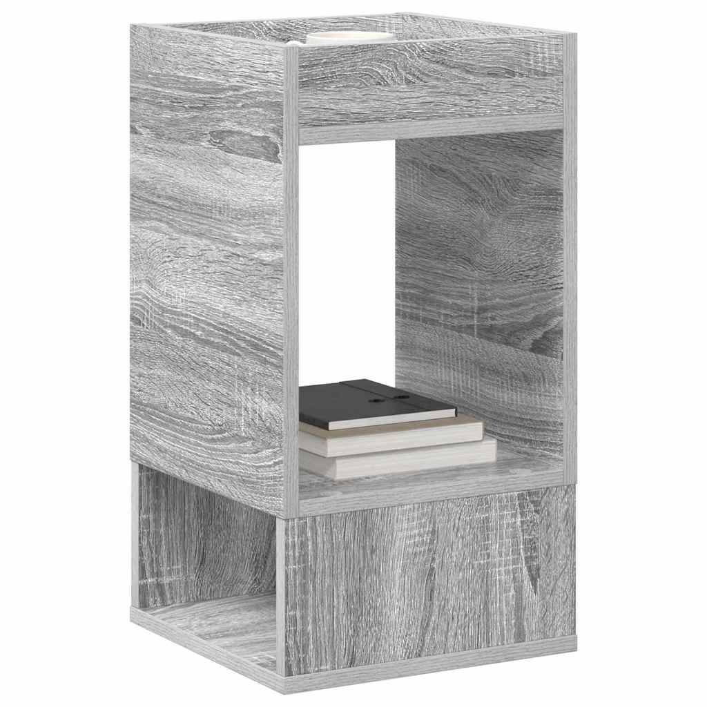 Ein grauer Holzbeistelltisch mit einem offenen Lagerwürfel in der Mitte, der zwei gestapelte Bücher zeigt. Die obere Fläche ist flach und leer.