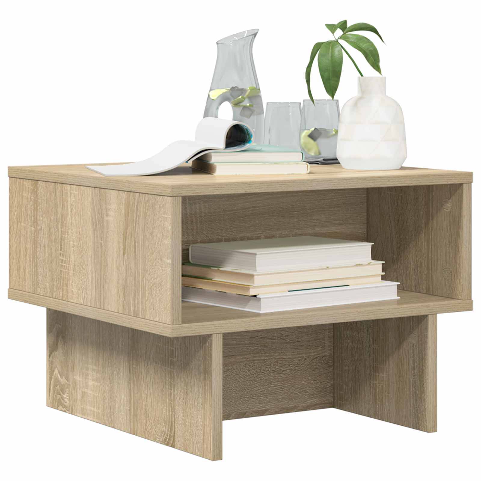 Ein modernes Wohnzimmer mit einem grauen Sofa, einem Holzcouchtisch mit Büchern und Pflanzen sowie abstrakte Kunstwerke an der Wand.