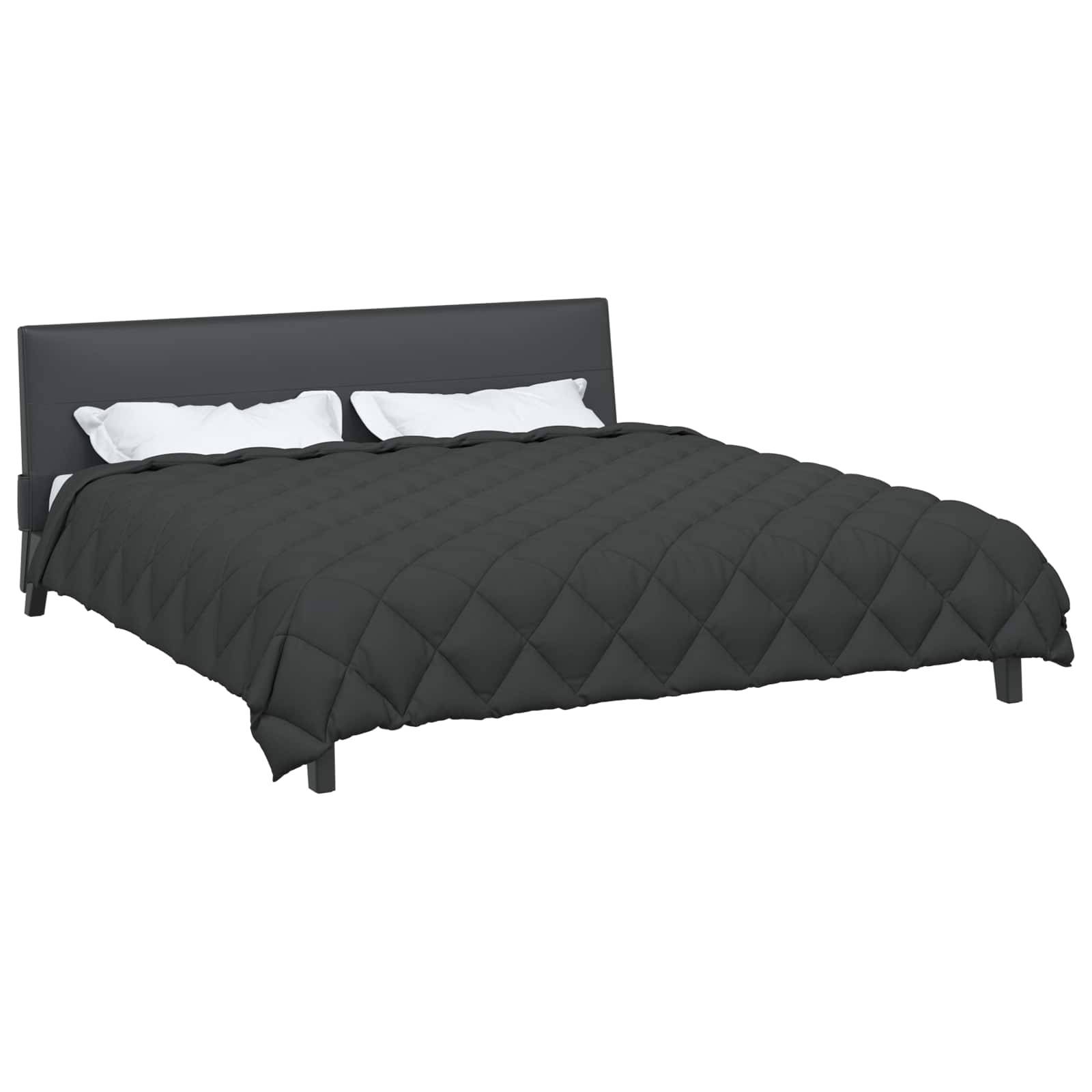 Ein dunkelgraues, gestepptes Kingsize-Bett mit geknöpftem Kopfteil, weißen Kissen und passender Bettwäsche.