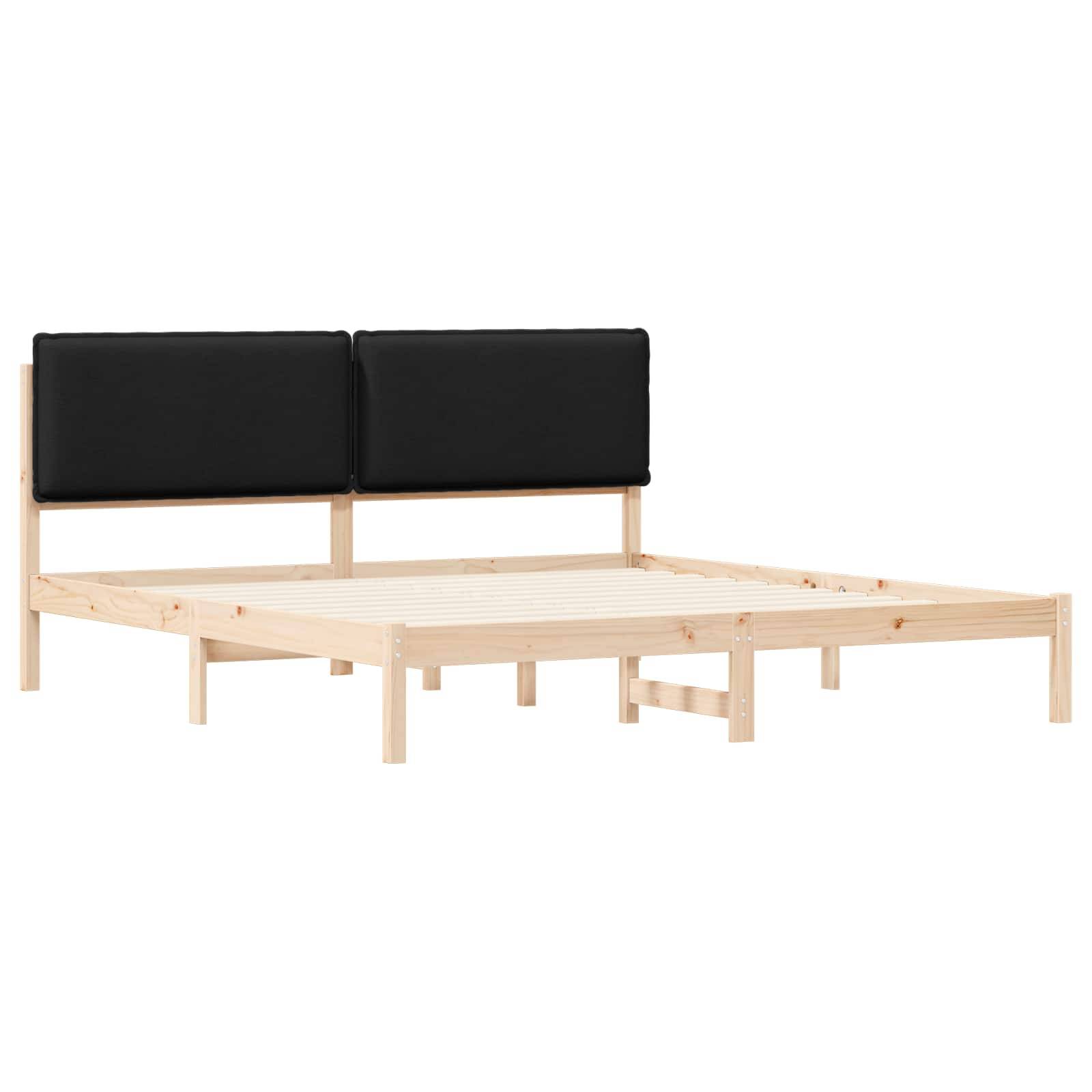 Holzbettrahmen mit heller Oberfläche und gepolstertem schwarzen Kopfteil, mit Latten-Untergrund ohne Matratze.