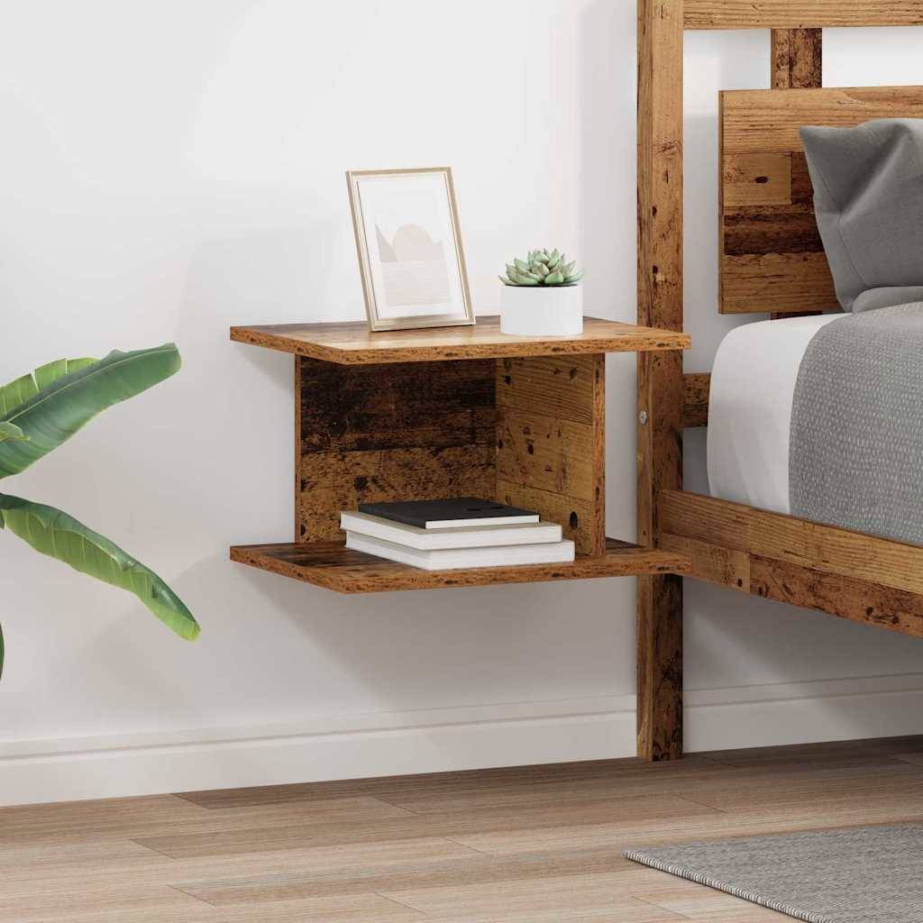 Holzbett mit Plattform und angebrachtem schwebendem Regal, auf dem eine Pflanze, zwei Bücher und ein Bilderrahmen stehen, neben einem Bett mit grauer Bettwäsche.