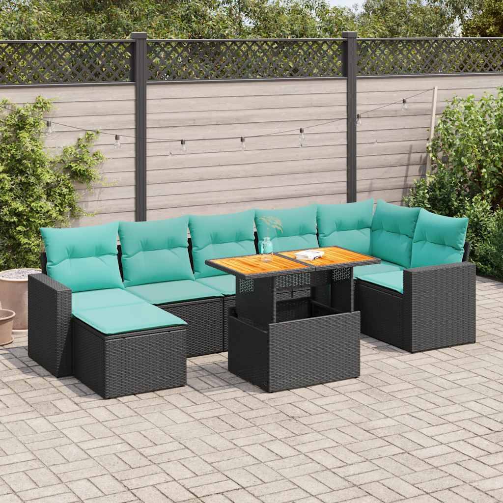 Gartenmöbelset im Freien mit türkisfarbenen Kissen auf einem Modulsofa und einem rechteckigen Tisch. Der Hintergrund zeigt einen Holzzaun und Grünanlagen.