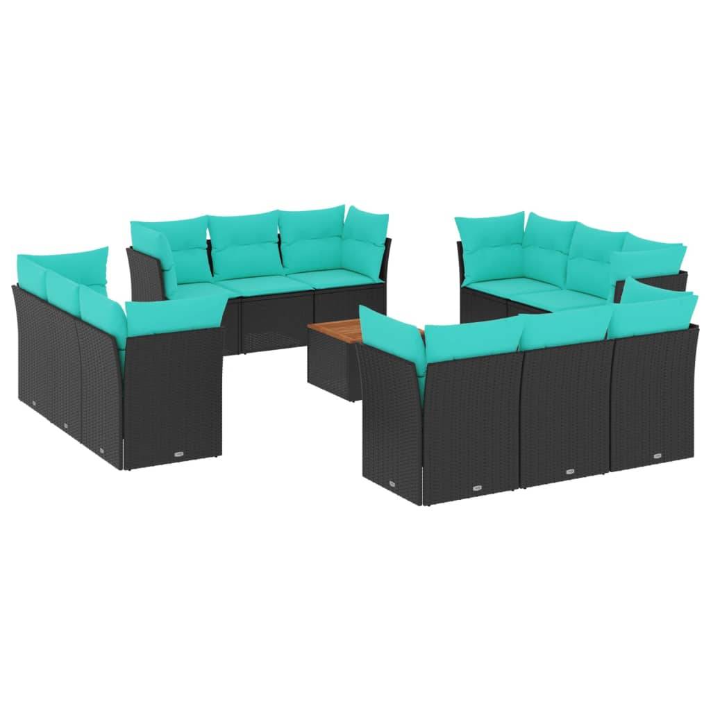 Gartenmöbelset im Außenbereich mit türkisfarbenen Kissen und dunklem Rattanrahmen in U-Form angeordnet, mit einem kleinen rechteckigen Couchtisch in der Mitte.