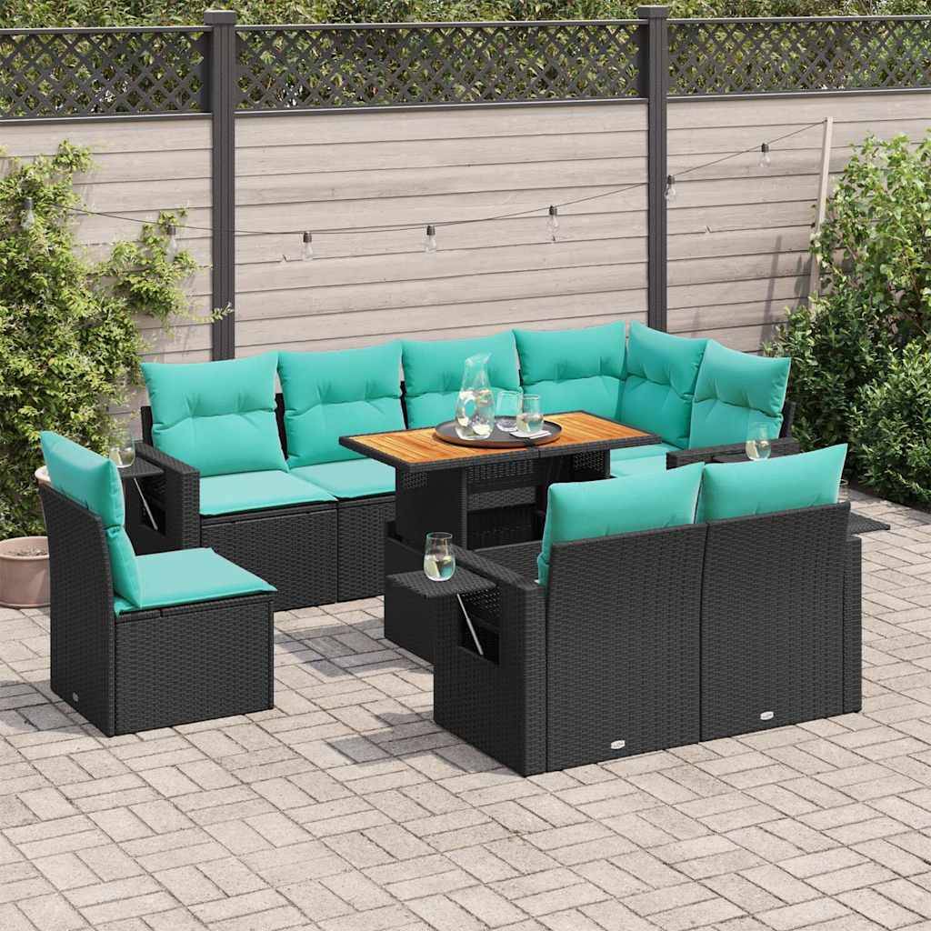 Gartenmöbelset im Freien mit türkisfarbenen Kissen auf schwarzen Rattanmöbeln. Umfasst ein L-förmiges Sofa, einen quadratischen Tisch und einen Stuhl.