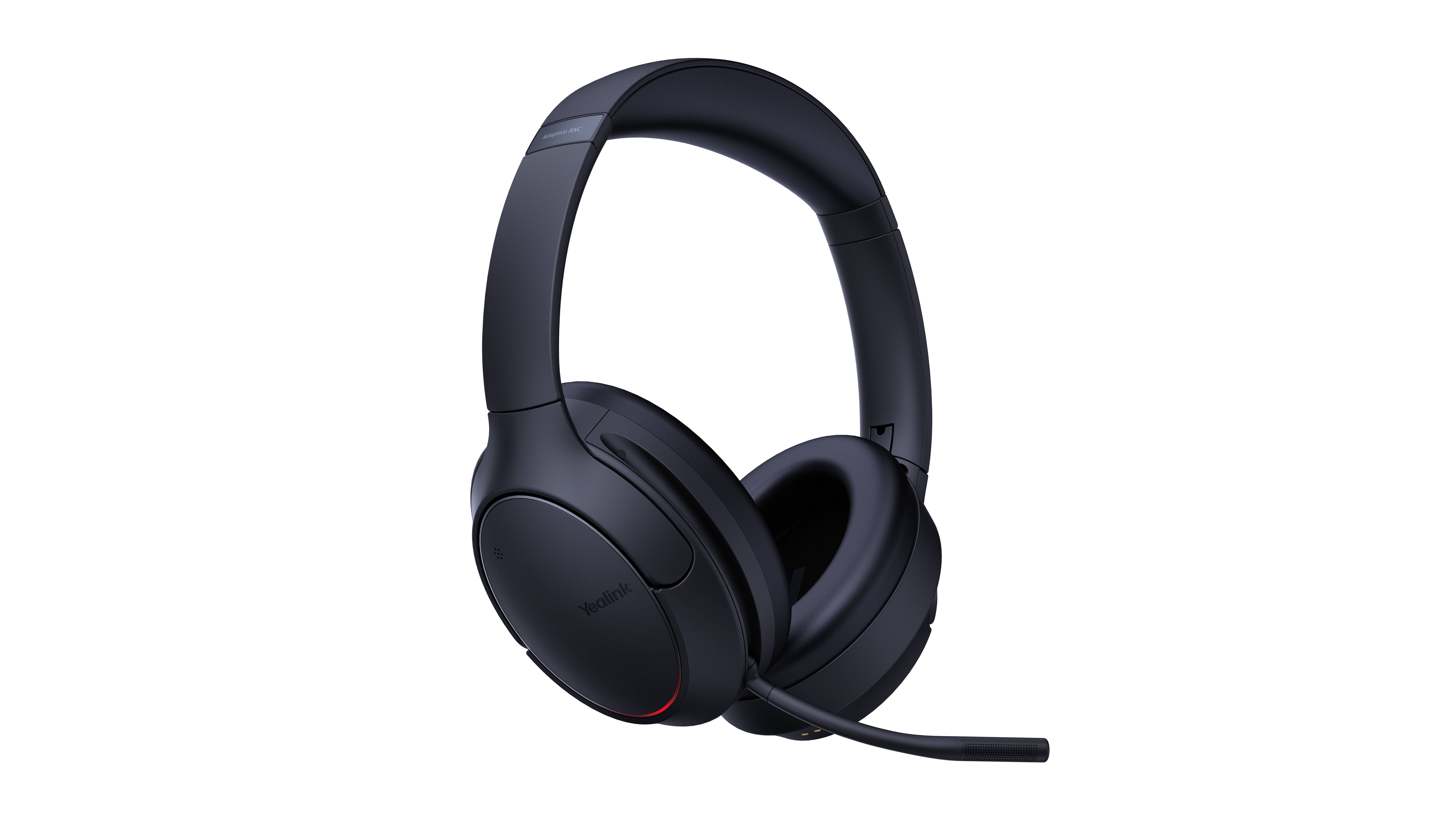 Schwarzes Over-Ear-Wireless-Gaming-Headset mit Boom-Mikrofon auf schwarzem Hintergrund.