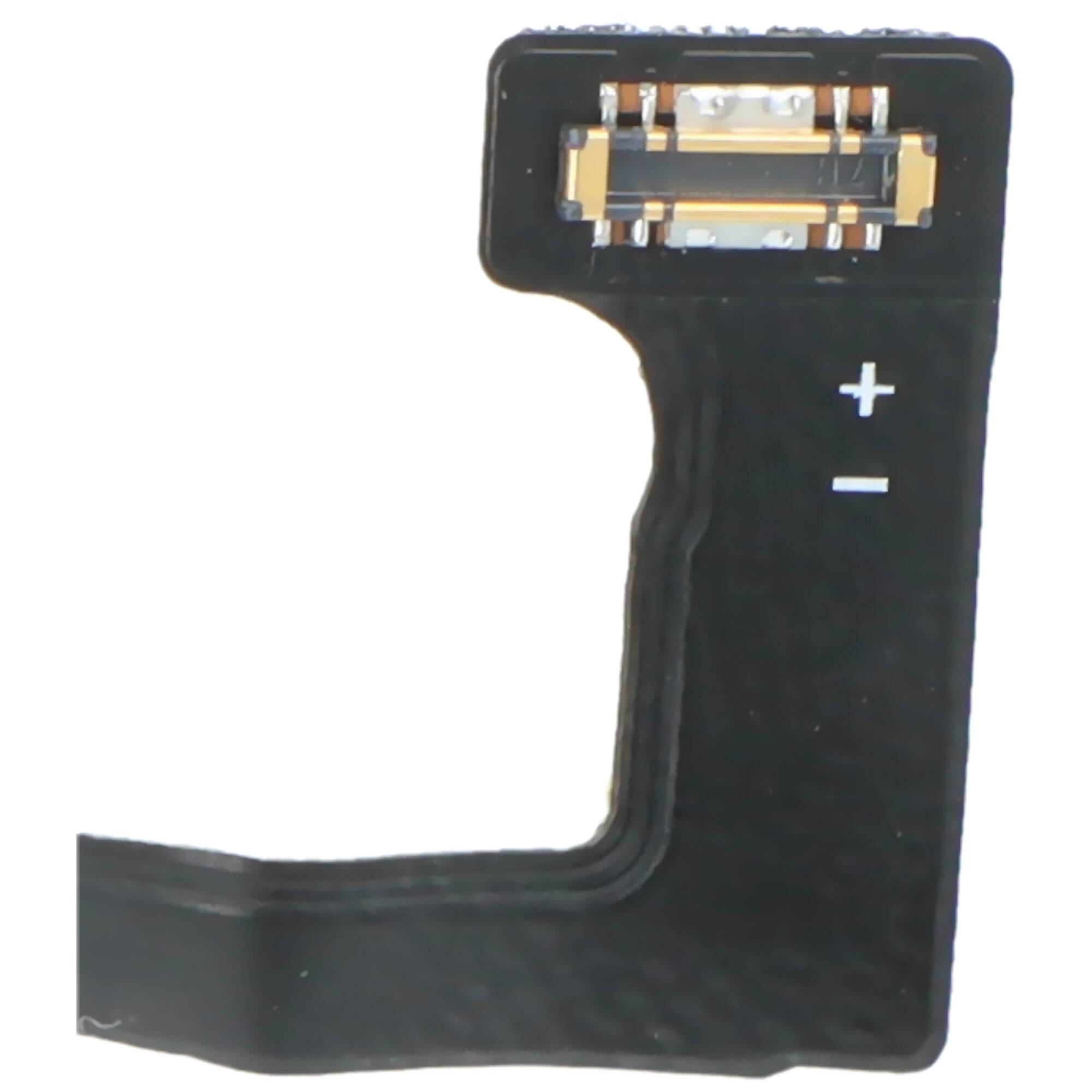 Eine Nahaufnahme eines Computersteckers, die ein kleines schwarzes L-förmiges Stück mit einem weißen Plus- und Minuszeichen zeigt, das die Polarität angibt.