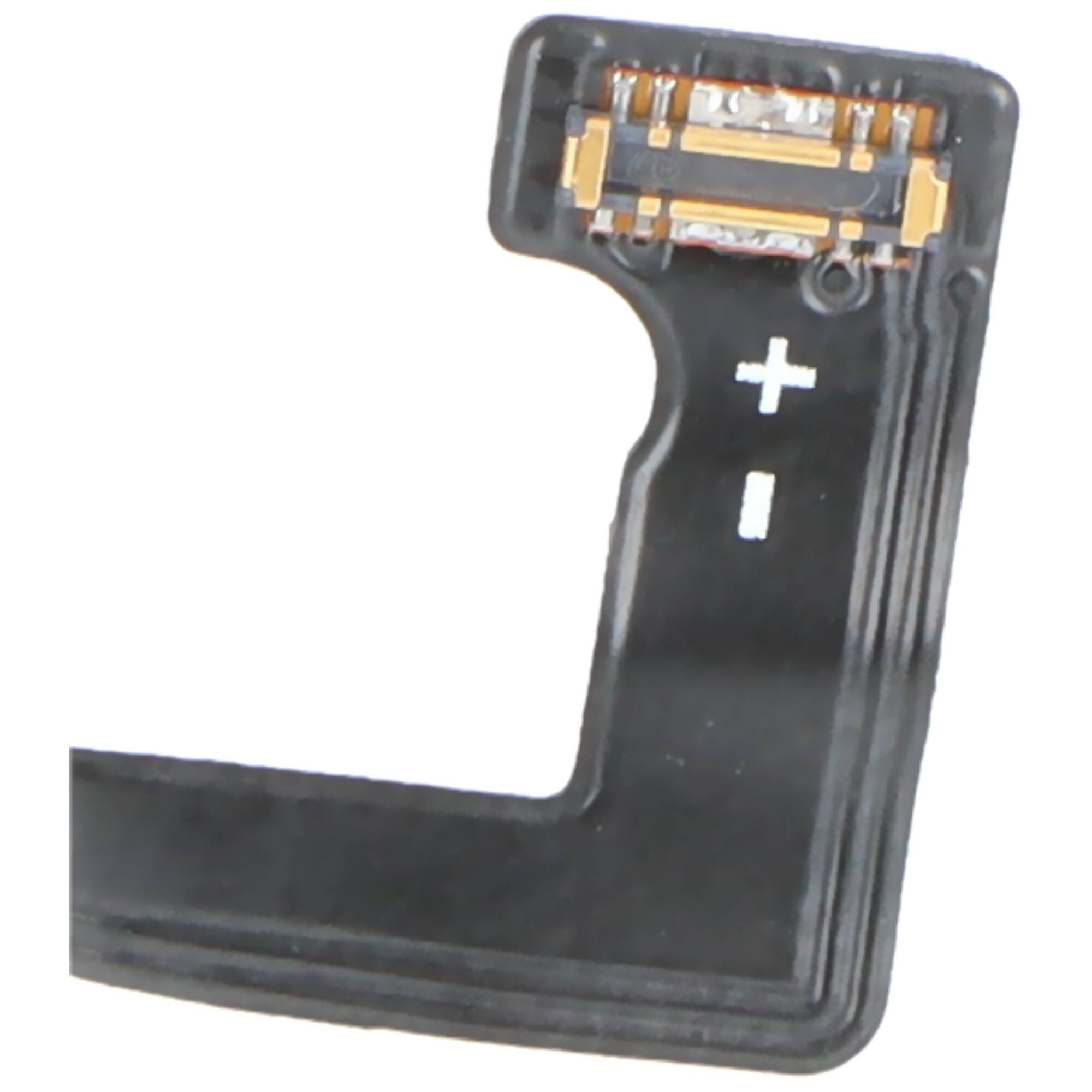 Eine Nahaufnahme eines flexiblen elektronischen Steckers mit goldenen Kontaktstiften auf einem schwarzen Streifen, die ein Plus- und Minuszeichen für die Polarität zeigen.