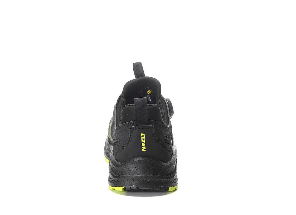 Ein schwarz-gelber Sneaker, von der Ferse aus gezeigt, mit dem Text „ETEN