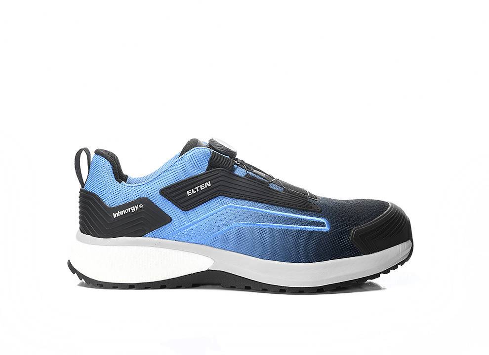 Ein blau und schwarzer Sportschuh mit dicker weißer Sohle, mit einer erhöhten Fersenzunge. Der Markenname „Elten