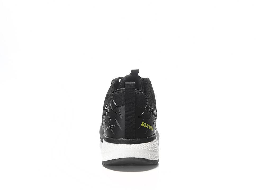 Rückansicht eines schwarzen Sneakers mit weißer Sohle und grünem Markenschriftzug „ELTEN