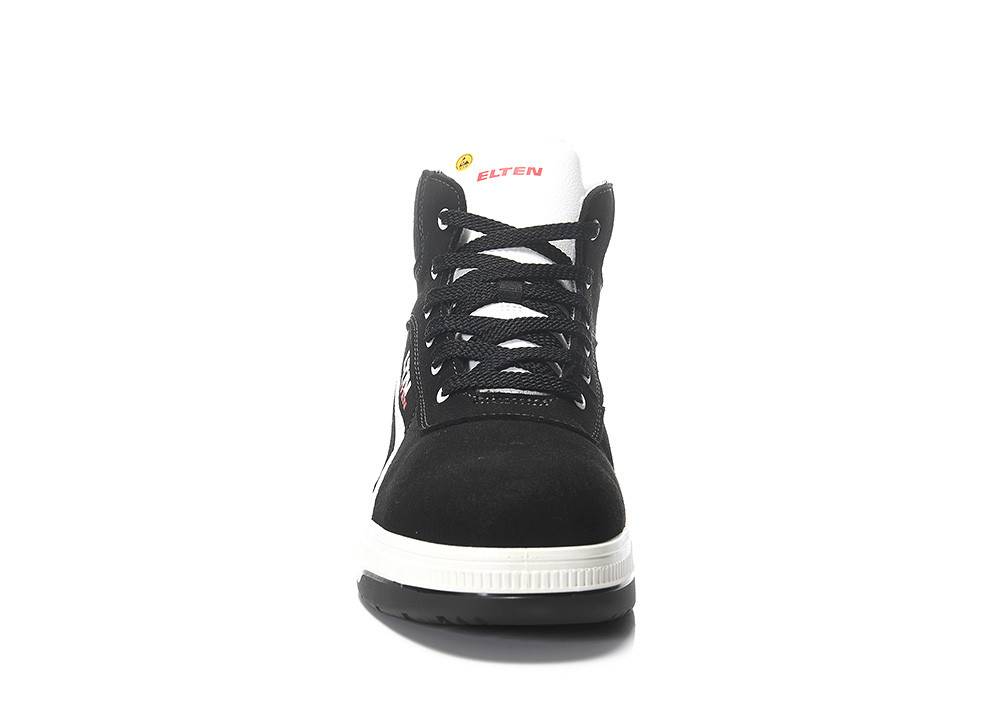 Ein schwarzweißer Sneaker von vorne gezeigt, mit einer dicken Sohle und schwarzen Schnürsenkeln. Der Markenname 'Elten' ist auf der Zunge sichtbar.