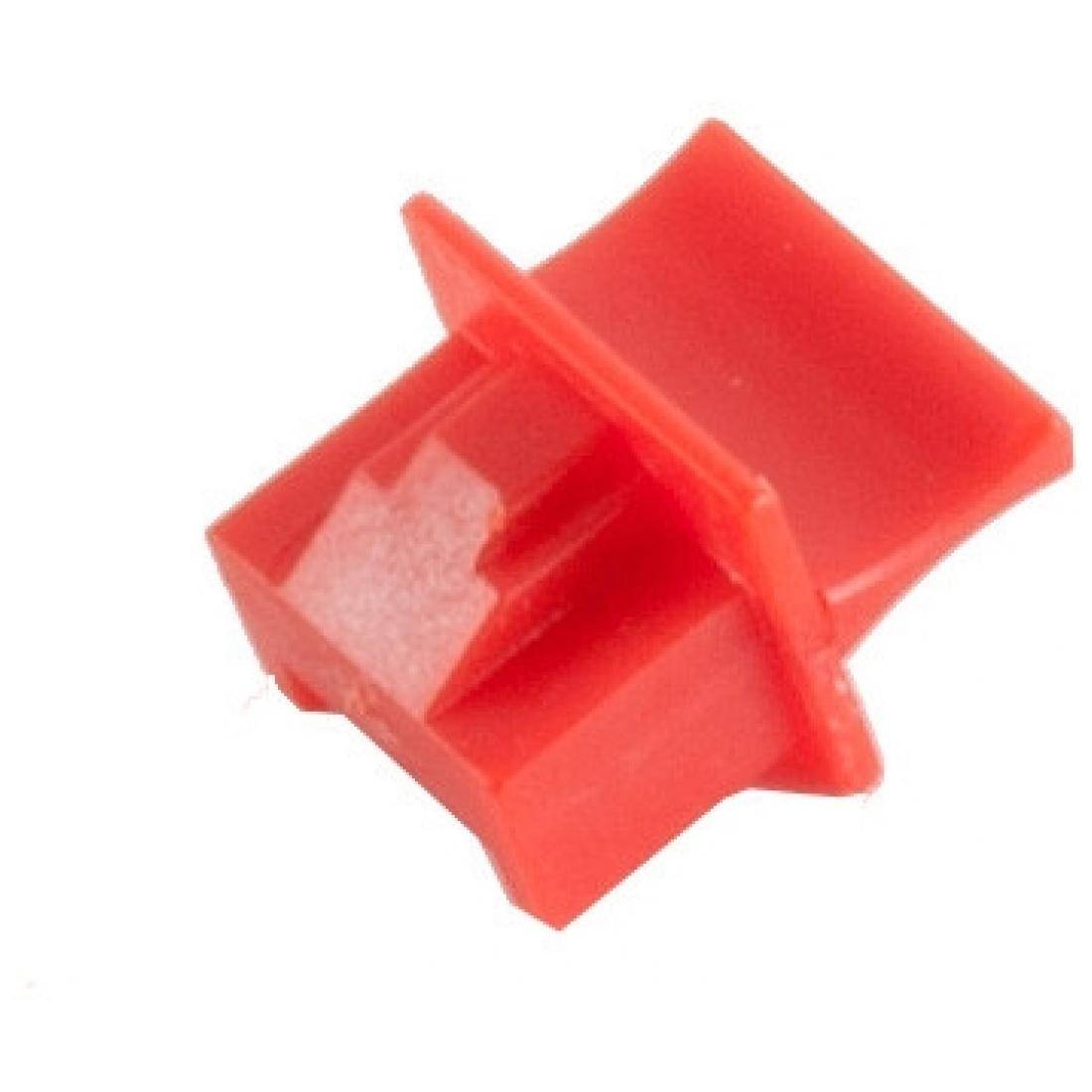 Eine kleine rote Kunststoff-Tastkappe für einen mechanischen Tastaturschalter mit einem kreuzförmigen Schaft.