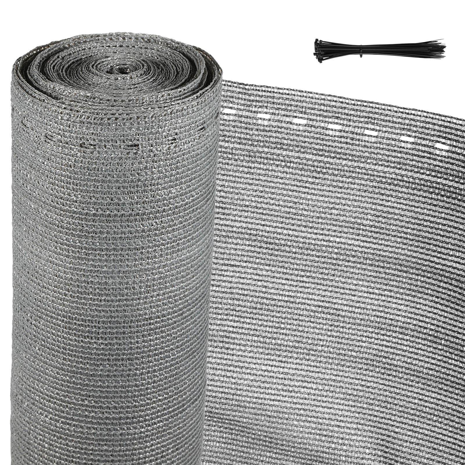 Rolle aus grauem Netzstoff mit schwarzen Kabelbindern.