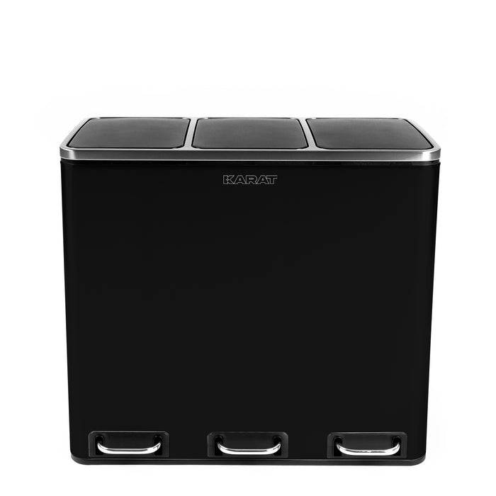 Ein schwarzer Mülleimer mit drei separaten Fächern und Fußpedalen zum Öffnen jedes Abschnitts, entwickelt für organisierte Abfalltrennung.