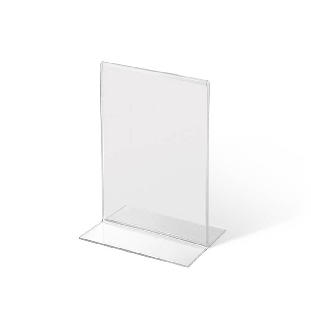 Eine Nahaufnahme einer schwarzen, aufgerollten Feder, die mit einer Metallkonstruktion verbunden ist, wahrscheinlich Teil eines Maschinenteils oder einer Ausrüstung.