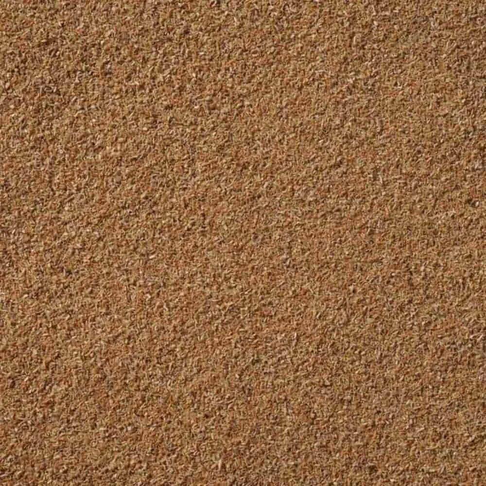 Eine Nahaufnahme einer Korkwand-Oberfläche, die ihre raue Textur und braune Farbe zeigt.