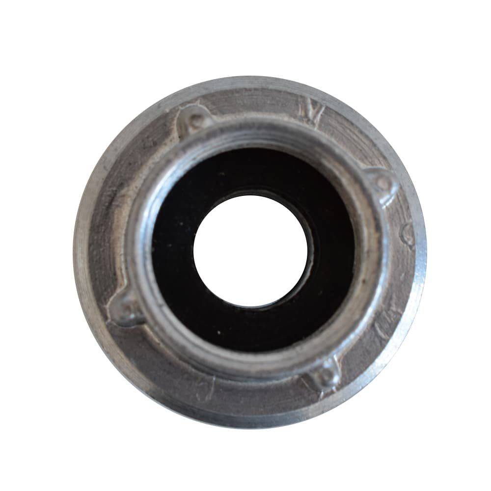 Metallisches kreisförmiges Teil mit einem zentralen schwarzen Loch, möglicherweise ein Lager oder ähnliche mechanische Komponente, von oben betrachtet.