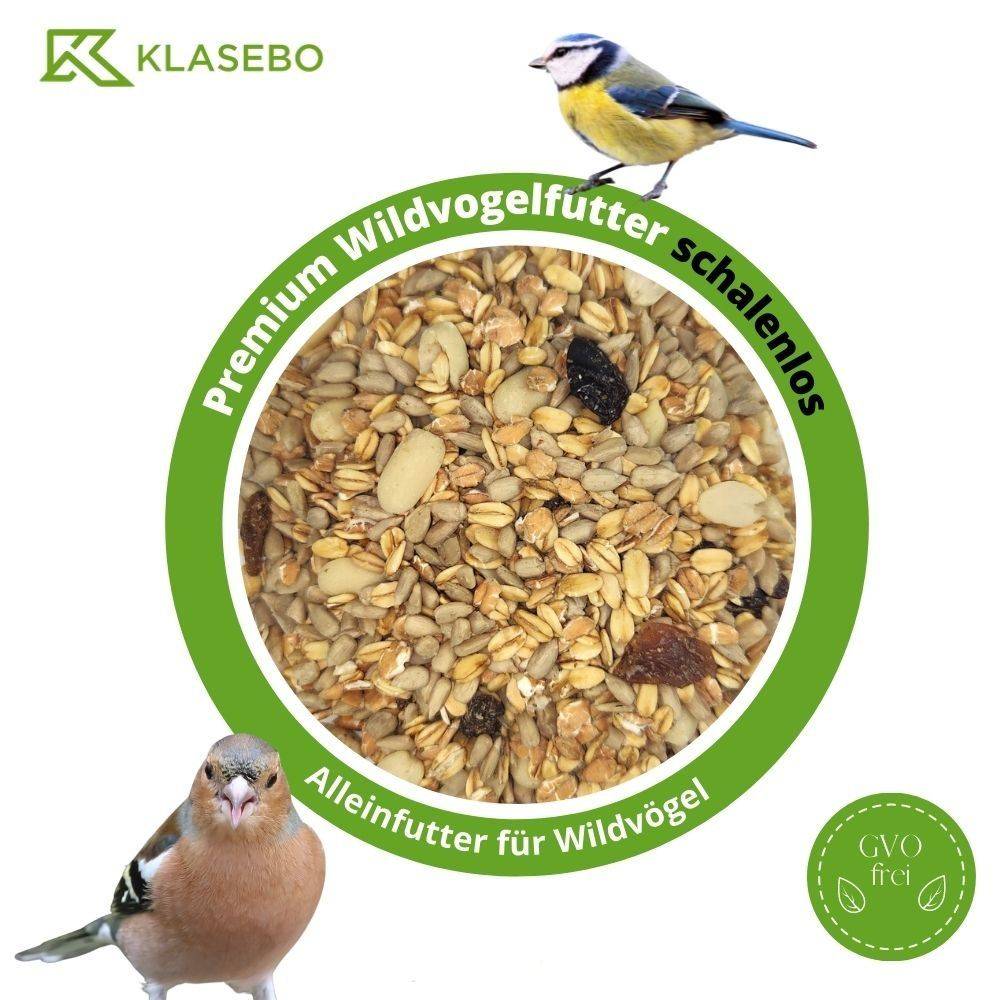 Ein kreisförmiges Bild von Vogelfutter mit dem Label „Premium Wildvogelfutter schalenlos