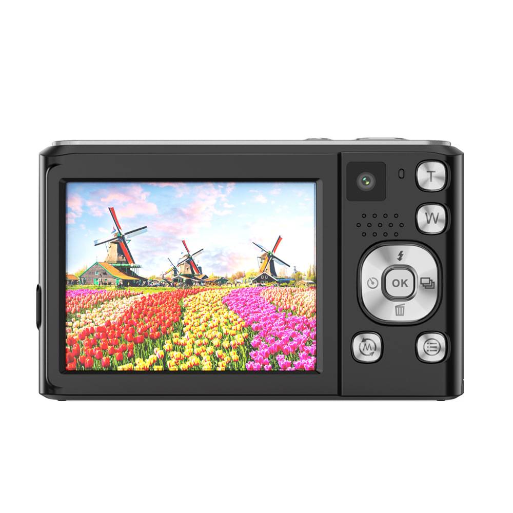 „Digitalkamera, die auf ihrem Display ein Foto von farbenfrohen Tulpenfeldern mit drei Windmühlen im Hintergrund zeigt, daneben Bedienungstasten.