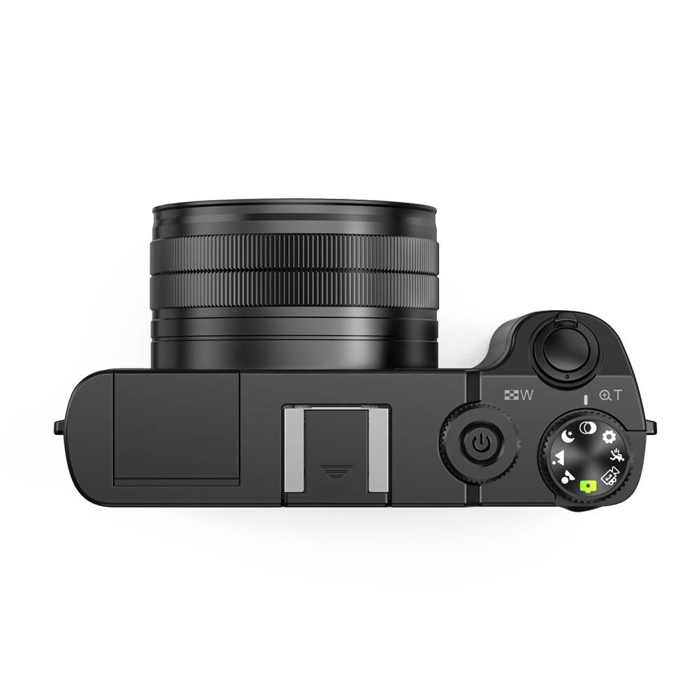 Draufsicht einer kompakten Digitalkamera mit dem Objektiv, dem Moduswahlrad und dem Ein-/Ausschalter.