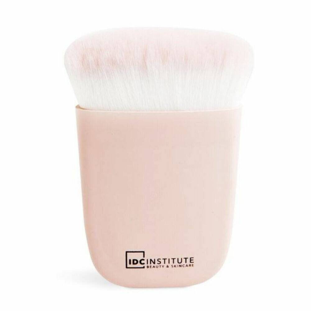 Ein weiches, flachkroniges Make-up-Pinsel mit rosa Griff, auf dem der Text „IDC Institute Beauty & Skincare