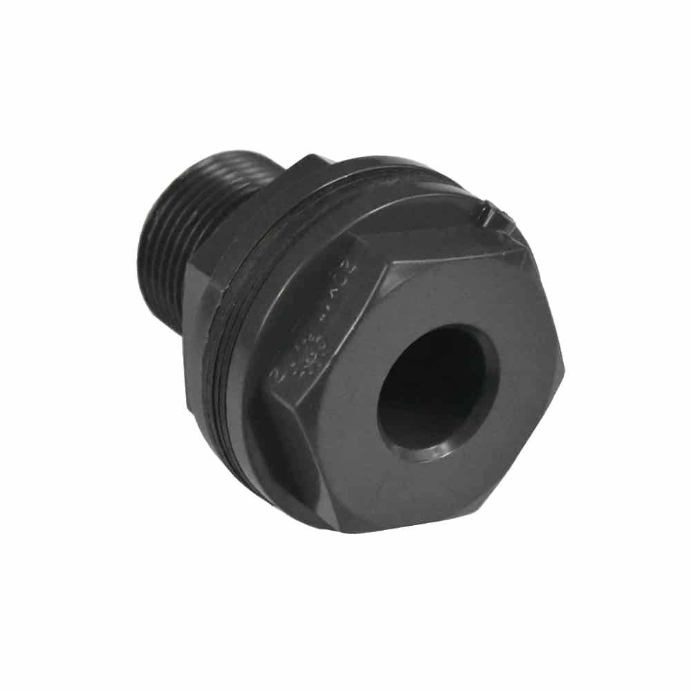 Nahaufnahme einer orangefarbenen Schutzmanschette mit quadratischer Oberflächenstruktur und hohler Mitte. Außenabmessungen: 28mm Breite; Innenabmessungen: je 9mm pro Seite.