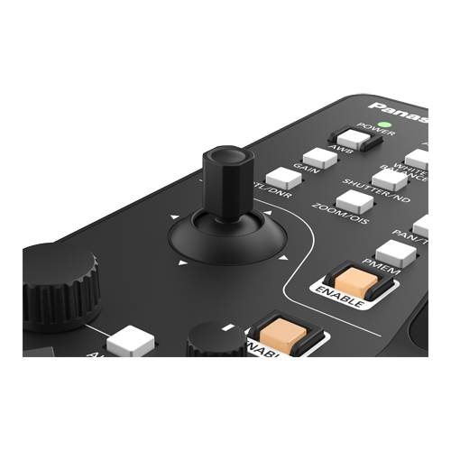 Eine Nahaufnahme eines Bedienfeldes mit mehreren Tasten, Drehreglern und einem Joystick, was auf ein Gerät zur präzisen Einstellung hindeutet.