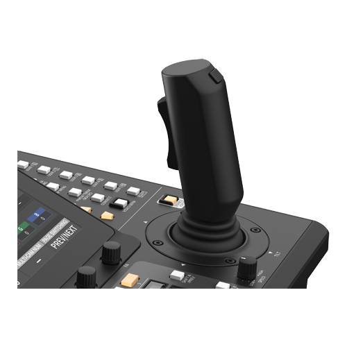 Ein Bedienfeld mit einem Joystick, mehreren Tasten und einem kleinen Bildschirm auf der linken Seite, wahrscheinlich zum Bedienen von komplexen Maschinen oder Systemen.